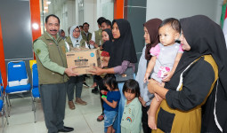 Otorita IKN Bagikan Makanan Tambahan hingga Masker untuk Warga